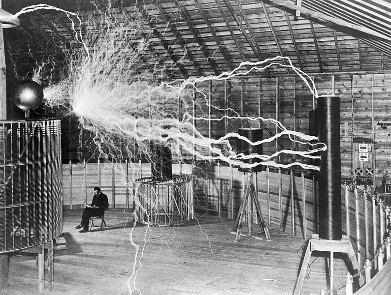 Nikola Tesla, with his equipment EDIT